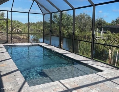 I present to you Cayo Sol, a new waterfront pool home with on Rotonda Golf and Country Club - Long Marsh  in Florida - for sale on GolfHomes.com, golf home, golf lot