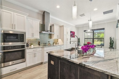 GORGEOUS POOL HOME - PREMIUM LOT - WATERFRONT - GOLF COURSES - on The Eagles Golf Course and Club in Florida - for sale on GolfHomes.com, golf home, golf lot