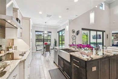GORGEOUS POOL HOME - PREMIUM LOT - WATERFRONT - GOLF COURSES - on The Eagles Golf Course and Club in Florida - for sale on GolfHomes.com, golf home, golf lot