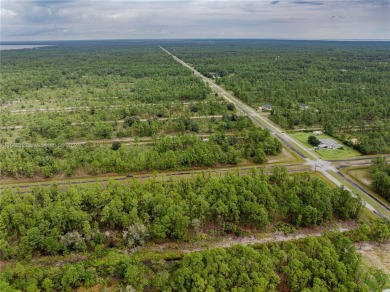 Exclusively listed by Sunland Real Estate: This 0.50-acre lot is on Indian Lake Estates Golf and Country Club in Florida - for sale on GolfHomes.com, golf home, golf lot