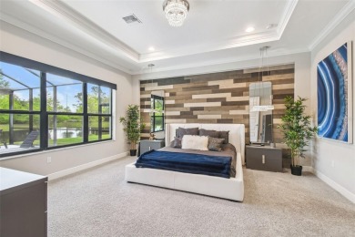 GORGEOUS POOL HOME - PREMIUM LOT - WATERFRONT - GOLF COURSES - on The Eagles Golf Course and Club in Florida - for sale on GolfHomes.com, golf home, golf lot