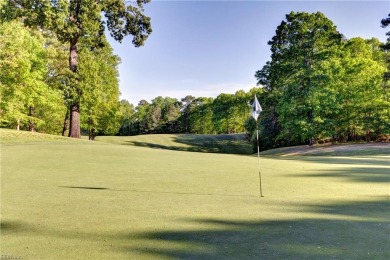 Set against a serene, park-like backdrop with a long view of the on The Tradition Golf Club At Stonehouse in Virginia - for sale on GolfHomes.com, golf home, golf lot