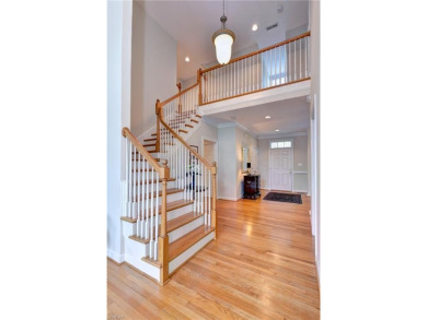 Set against a serene, park-like backdrop with a long view of the on The Tradition Golf Club At Stonehouse in Virginia - for sale on GolfHomes.com, golf home, golf lot