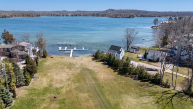 Big Cedar Lake on West Bend Golf Country Club in Wisconsin - for sale on GolfHomes.com, golf home, golf lot