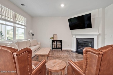 Easy living in this one level home with lawncare included! This on Cape Fear National At Brunswick Forest in North Carolina - for sale on GolfHomes.com, golf home, golf lot