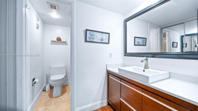 Beautifully updated 2-bed, 2-bath condo in Whitehall at Pine on Pine Island Ridge Country Club in Florida - for sale on GolfHomes.com, golf home, golf lot