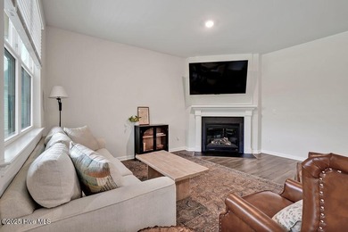 Easy living in this one level home with lawncare included! This on Cape Fear National At Brunswick Forest in North Carolina - for sale on GolfHomes.com, golf home, golf lot