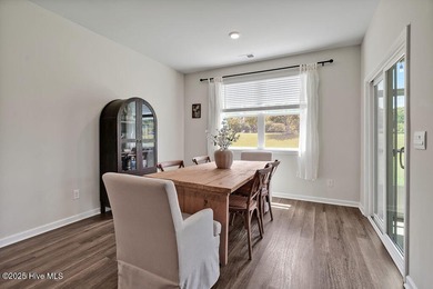 Easy living in this one level home with lawncare included! This on Cape Fear National At Brunswick Forest in North Carolina - for sale on GolfHomes.com, golf home, golf lot