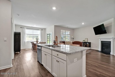 Easy living in this one level home with lawncare included! This on Cape Fear National At Brunswick Forest in North Carolina - for sale on GolfHomes.com, golf home, golf lot