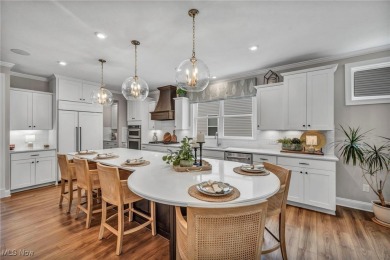 Poised in the coveted Quail Hollow community, this showstopper on Quail Hollow Resort and Country Club in Ohio - for sale on GolfHomes.com, golf home, golf lot