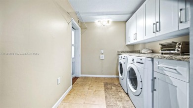 Beautifully updated 2-bed, 2-bath condo in Whitehall at Pine on Pine Island Ridge Country Club in Florida - for sale on GolfHomes.com, golf home, golf lot