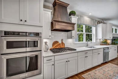 Poised in the coveted Quail Hollow community, this showstopper on Quail Hollow Resort and Country Club in Ohio - for sale on GolfHomes.com, golf home, golf lot