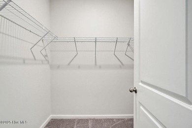 Easy living in this one level home with lawncare included! This on Cape Fear National At Brunswick Forest in North Carolina - for sale on GolfHomes.com, golf home, golf lot