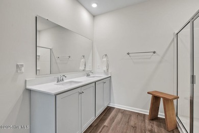 Easy living in this one level home with lawncare included! This on Cape Fear National At Brunswick Forest in North Carolina - for sale on GolfHomes.com, golf home, golf lot