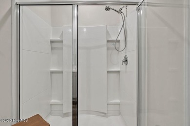 Easy living in this one level home with lawncare included! This on Cape Fear National At Brunswick Forest in North Carolina - for sale on GolfHomes.com, golf home, golf lot