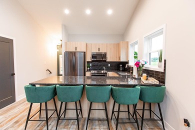 Contemporary and Comfortable!  Step into modern comfort with on Mariners Landing Golf and Country Club in Virginia - for sale on GolfHomes.com, golf home, golf lot