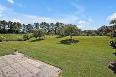 Easy living in this one level home with lawncare included! This on Cape Fear National At Brunswick Forest in North Carolina - for sale on GolfHomes.com, golf home, golf lot