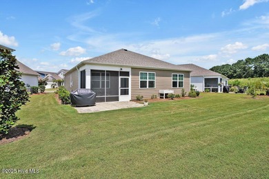 Easy living in this one level home with lawncare included! This on Cape Fear National At Brunswick Forest in North Carolina - for sale on GolfHomes.com, golf home, golf lot
