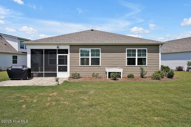 Easy living in this one level home with lawncare included! This on Cape Fear National At Brunswick Forest in North Carolina - for sale on GolfHomes.com, golf home, golf lot