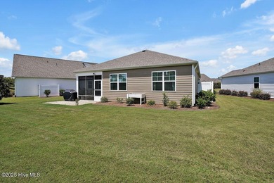 Easy living in this one level home with lawncare included! This on Cape Fear National At Brunswick Forest in North Carolina - for sale on GolfHomes.com, golf home, golf lot