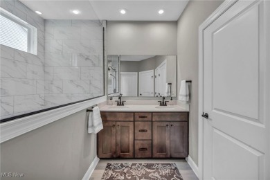 Poised in the coveted Quail Hollow community, this showstopper on Quail Hollow Resort and Country Club in Ohio - for sale on GolfHomes.com, golf home, golf lot