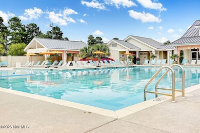 Easy living in this one level home with lawncare included! This on Cape Fear National At Brunswick Forest in North Carolina - for sale on GolfHomes.com, golf home, golf lot