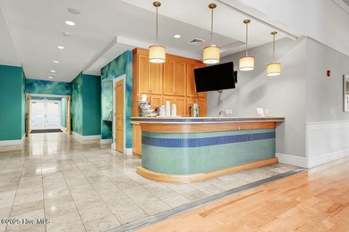 Easy living in this one level home with lawncare included! This on Cape Fear National At Brunswick Forest in North Carolina - for sale on GolfHomes.com, golf home, golf lot