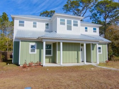 This newly constructed 3-bedroom, 3.5-bathroom home in on St. James Bay in Florida - for sale on GolfHomes.com, golf home, golf lot