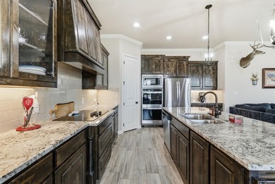 Welcome home to this beautifully designed newer-built property on Legends Country Club in Texas - for sale on GolfHomes.com, golf home, golf lot