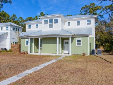 This newly constructed 3-bedroom, 3.5-bathroom home in on St. James Bay in Florida - for sale on GolfHomes.com, golf home, golf lot