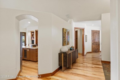 Exquisitely maintained custom home offers enduring finishes from on River Valley Ranch Golf Club in Colorado - for sale on GolfHomes.com, golf home, golf lot