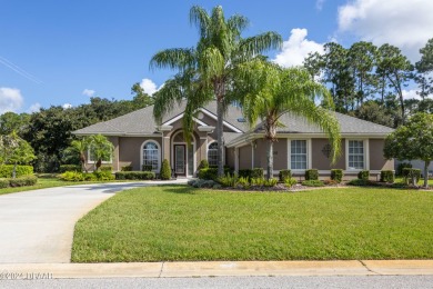 Enjoy Florida living with Palm trees & nature views. The quiet on Plantation Bay Golf and Country Club in Florida - for sale on GolfHomes.com, golf home, golf lot