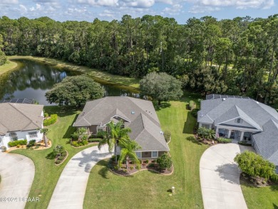 Enjoy Florida living with Palm trees & nature views. The quiet on Plantation Bay Golf and Country Club in Florida - for sale on GolfHomes.com, golf home, golf lot