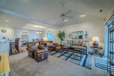 Top-Floor Palisades Condo with Main Channel Views! Enjoy on Tan-Tar-A Golf Club in Missouri - for sale on GolfHomes.com, golf home, golf lot