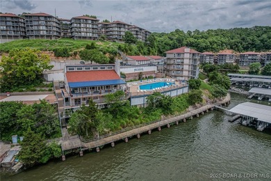 Top-Floor Palisades Condo with Main Channel Views! Enjoy on Tan-Tar-A Golf Club in Missouri - for sale on GolfHomes.com, golf home, golf lot