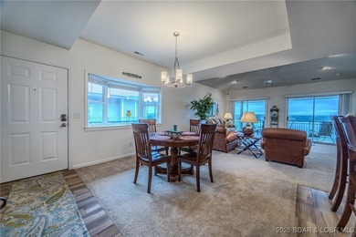 Top-Floor Palisades Condo with Main Channel Views! Enjoy on Tan-Tar-A Golf Club in Missouri - for sale on GolfHomes.com, golf home, golf lot