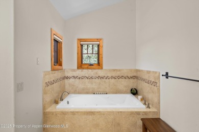 Exquisitely maintained custom home offers enduring finishes from on River Valley Ranch Golf Club in Colorado - for sale on GolfHomes.com, golf home, golf lot