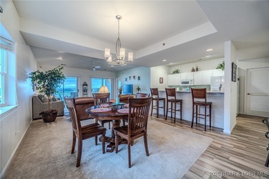 Top-Floor Palisades Condo with Main Channel Views! Enjoy on Tan-Tar-A Golf Club in Missouri - for sale on GolfHomes.com, golf home, golf lot