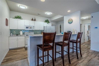 Top-Floor Palisades Condo with Main Channel Views! Enjoy on Tan-Tar-A Golf Club in Missouri - for sale on GolfHomes.com, golf home, golf lot