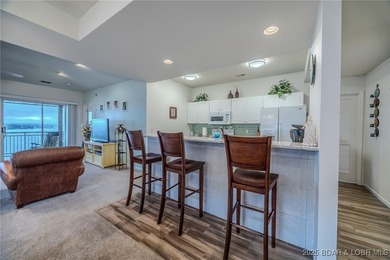 Top-Floor Palisades Condo with Main Channel Views! Enjoy on Tan-Tar-A Golf Club in Missouri - for sale on GolfHomes.com, golf home, golf lot