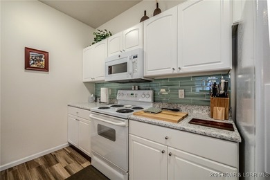 Top-Floor Palisades Condo with Main Channel Views! Enjoy on Tan-Tar-A Golf Club in Missouri - for sale on GolfHomes.com, golf home, golf lot