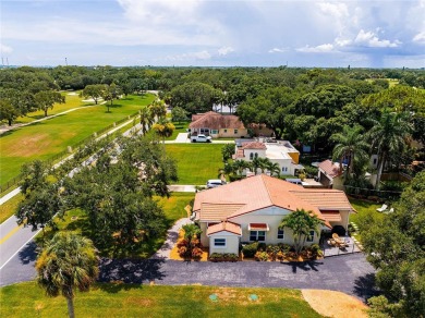 Immaculate, beautifully landscaped, historic Spanish style home on Vero Beach Country Club in Florida - for sale on GolfHomes.com, golf home, golf lot