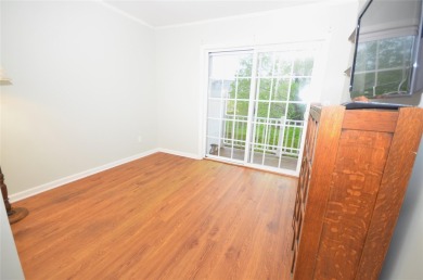 Light-filled Upper Cordova condo at the prestigious 55+ The on The Greens At Half Hollow in New York - for sale on GolfHomes.com, golf home, golf lot