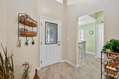 Nestled inside the sought-after 55+ golf community of Royal on Monarch At Royal Highlands in Florida - for sale on GolfHomes.com, golf home, golf lot