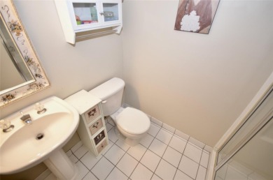 Light-filled Upper Cordova condo at the prestigious 55+ The on The Greens At Half Hollow in New York - for sale on GolfHomes.com, golf home, golf lot