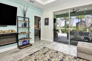 This STYLISH Jamaica Villa w/ custom paint & fireplace & wood on LPGA International Golf Course in Florida - for sale on GolfHomes.com, golf home, golf lot