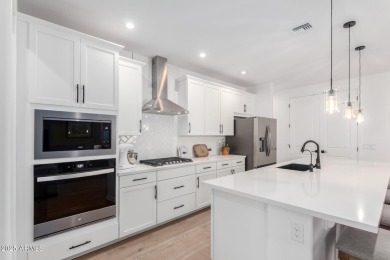 This impeccably maintained, turnkey 4 bedroom, 2.5 bath home on Estrella Mountain Ranch Golf Course in Arizona - for sale on GolfHomes.com, golf home, golf lot