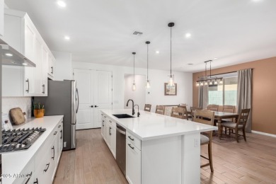 This impeccably maintained, turnkey 4 bedroom, 2.5 bath home on Estrella Mountain Ranch Golf Course in Arizona - for sale on GolfHomes.com, golf home, golf lot