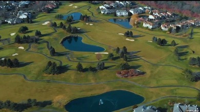 Light-filled Upper Cordova condo at the prestigious 55+ The on The Greens At Half Hollow in New York - for sale on GolfHomes.com, golf home, golf lot