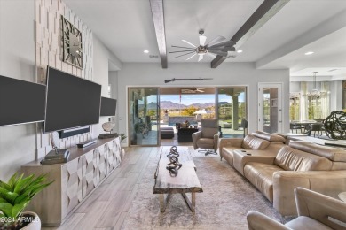 Discover unparalleled luxury in this David Weekley home, located on Verrado Golf Club - Victory in Arizona - for sale on GolfHomes.com, golf home, golf lot